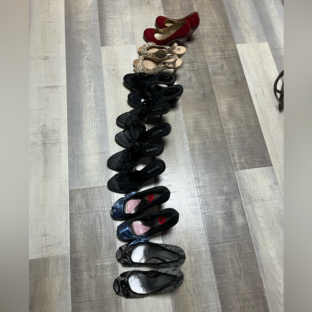 7 pairs Womens high heel shoes. Most are brand new/others been worn once. Size 6